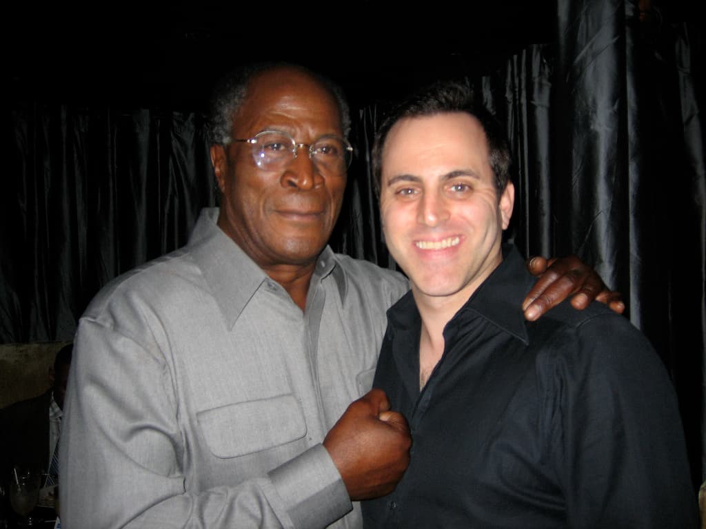 Ray and John Amos of Roots, Good Times, and Coming to America at a celebrity event in New York